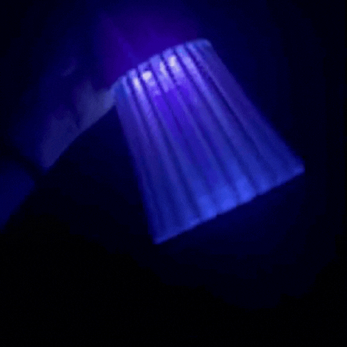 MosquitoZap glowing purple at night